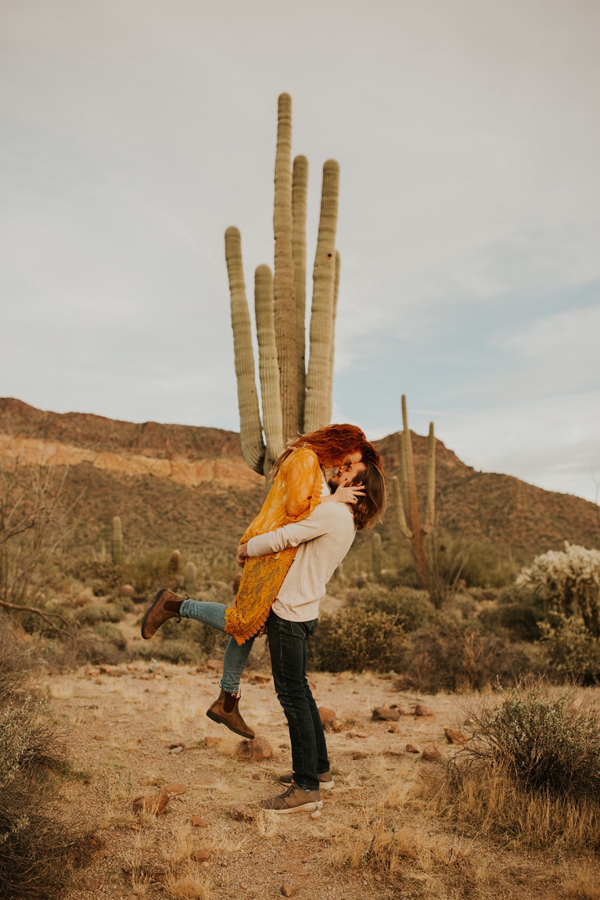 Fun playful couple photos in the Arizona desert